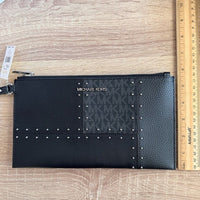Michael Kors Large Jet Set Travel wristlet bag with patches, studs