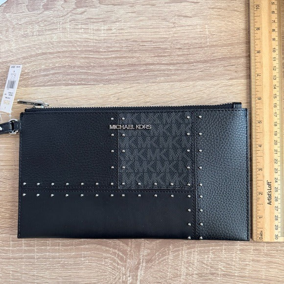 Michael Kors Large Jet Set Travel wristlet bag with patches, studs