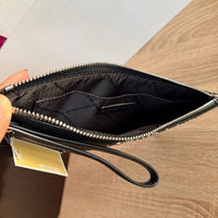 Michael Kors Large Jet Set Travel wristlet bag with patches, studs