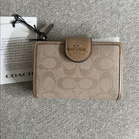 NTW COACH Medium Corner Zip Wallet With Signature Canvas