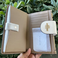 Phone Wallet In Signature Canvas With Floral Print