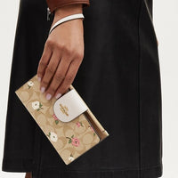 Phone Wallet In Signature Canvas With Floral Print